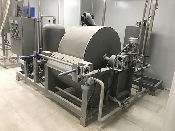 Filtru cu tambur de vid rotativ